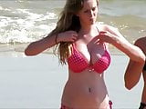 busty brunette bikini girl on the beach